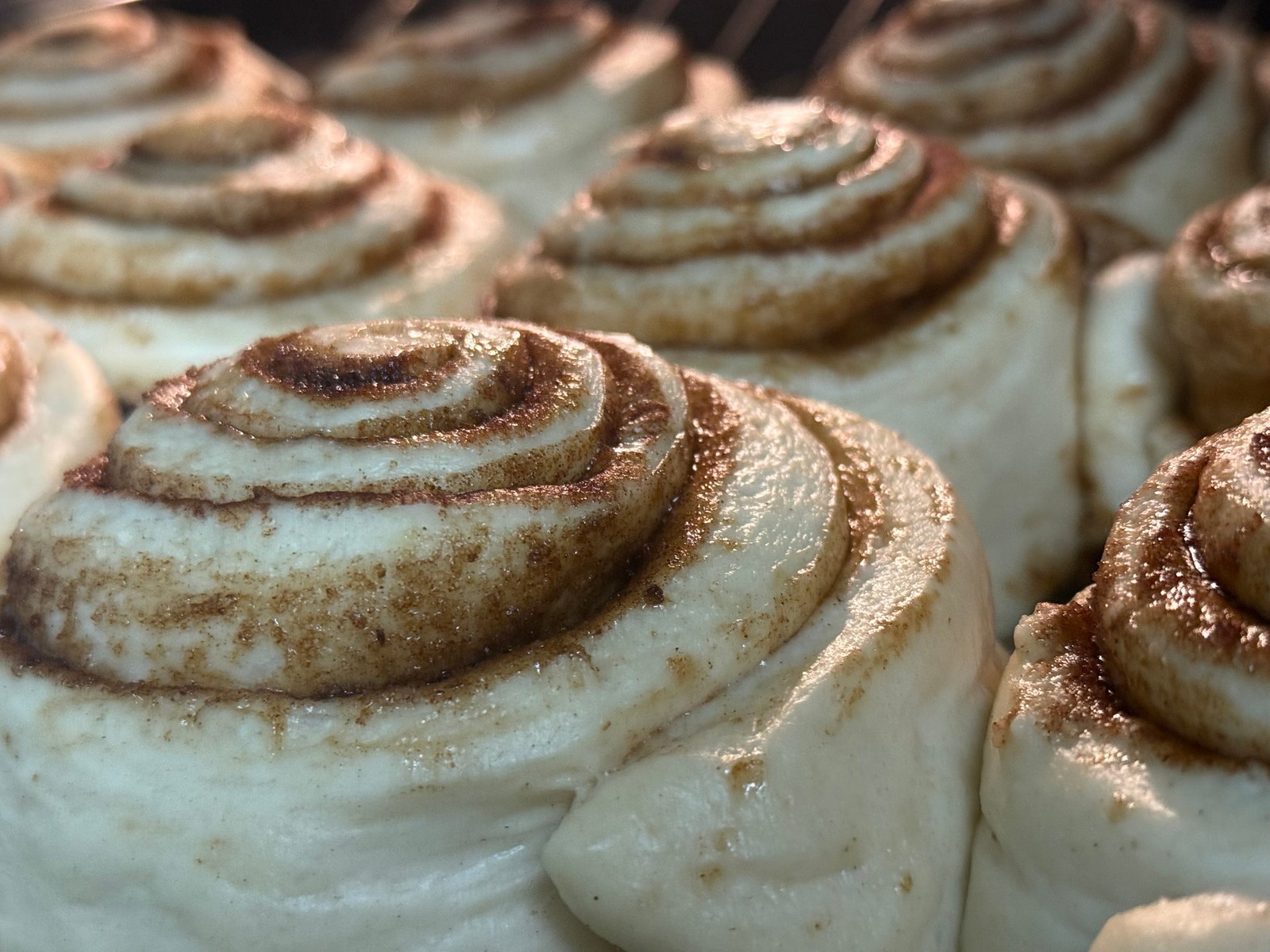 Milkshake, cake slice and cinnamon roll